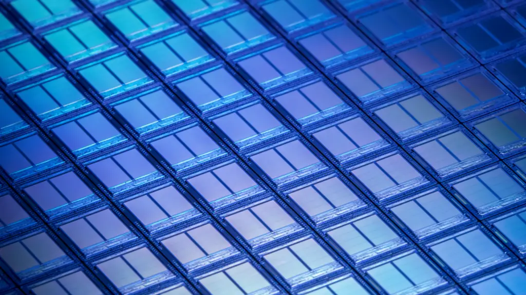 Flash Memory Wafer Macro Detail - stock photo: Slash Memory Chips seen at 10x Macro Magnification in UV light.