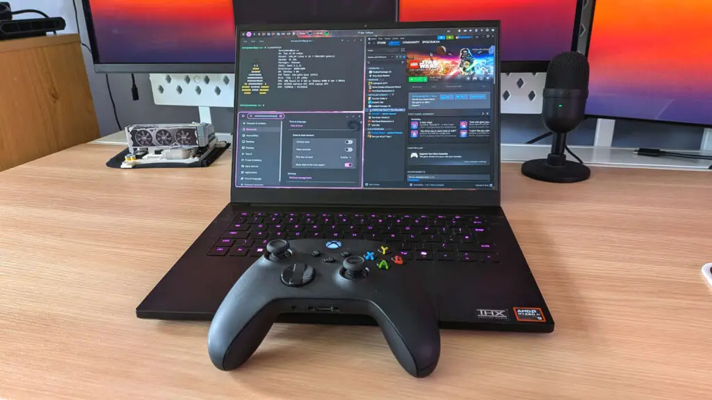 Razer Blade 14 gaming laptop running PopOS with an Xbox Wireless controller