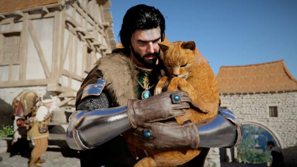 Kliff cuddling an orange cat in Crimson Desert.