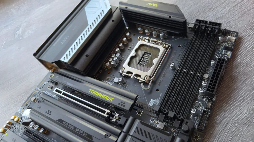A photo of the MSI MAG Z890 Tomahawk WiFi motherboard, focused on the CPU and DRAM sockets.