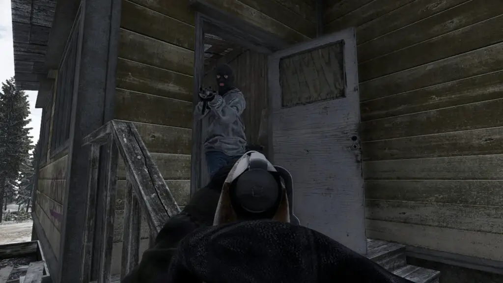 A player points a Mosin rifle at a bandit in Road to Vostok.