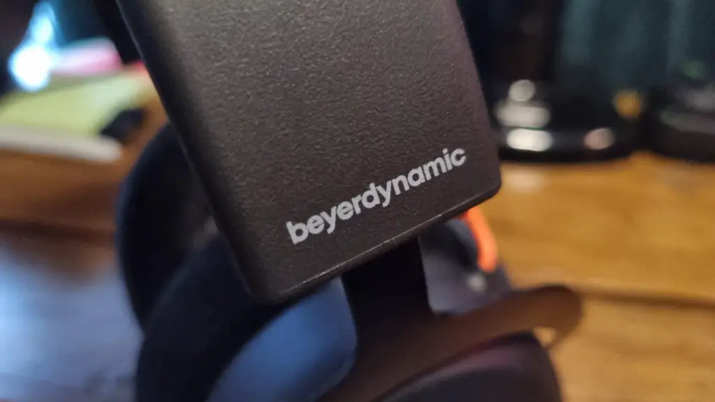 An image of the Beyerdynamic text on the side of the headband of a Beyerdynamic MMX 150 Wireless gaming headset