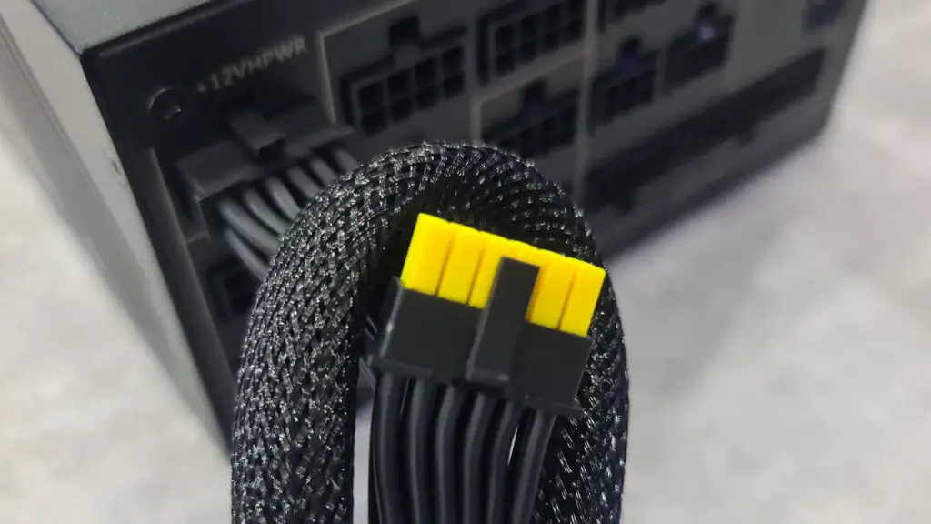 MSI power supply 12VHPWR cable with yellow coloring indicating seating depth.