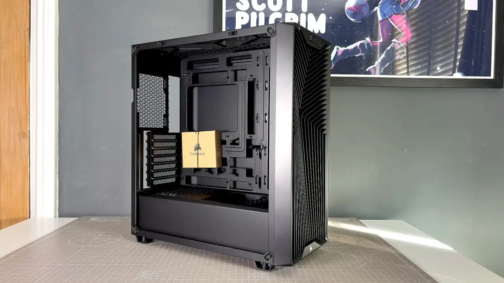 The Corsair 3200D PC case shown on a workspace during a custom PC build.