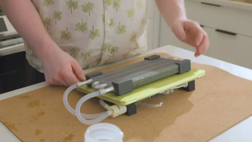 Internal view of the custom water block on the MacBook Neo