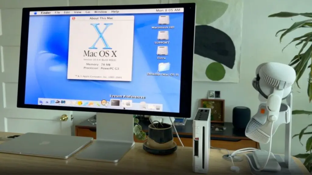 An image of macOS X working on a nintendo Wii, with an Apple Vision Pro to the right.