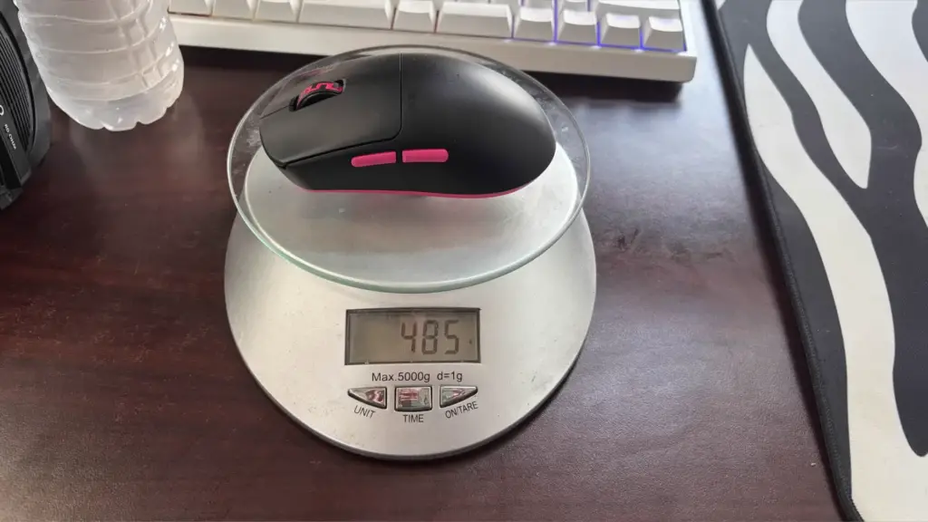 Boardzy weighing the Pulsar CrazyHeavy mouse at 485 grams