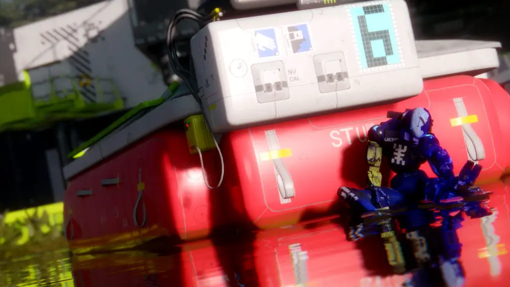 Marathon Server Slam: A dead robot slumped against a large flatbed in the water outside a facility.