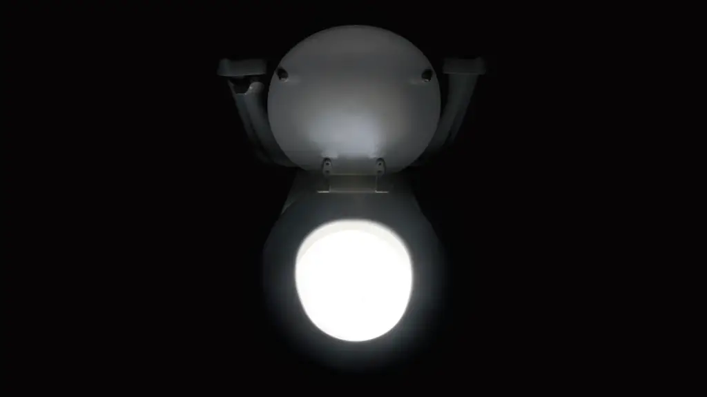 Toilet glowing and emitting light in the bathroom - stock photo