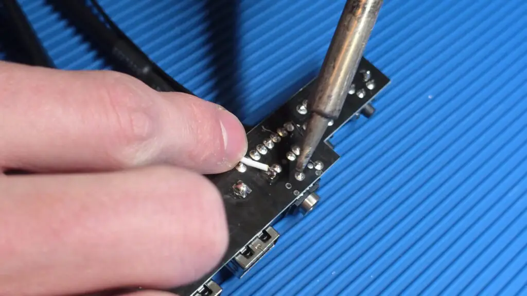 A screenshot of a video by Adam Lee/mryeester, showing the modification of a PC case front panel board